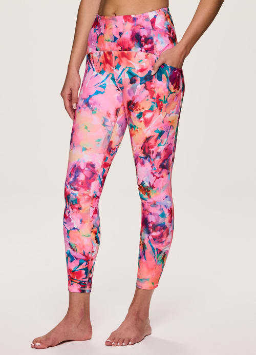 Black peach skin leggings with a multicolored floral print